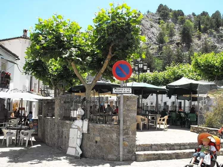 Restaurants on the central square of whitewashed Andalusian village Grazalema