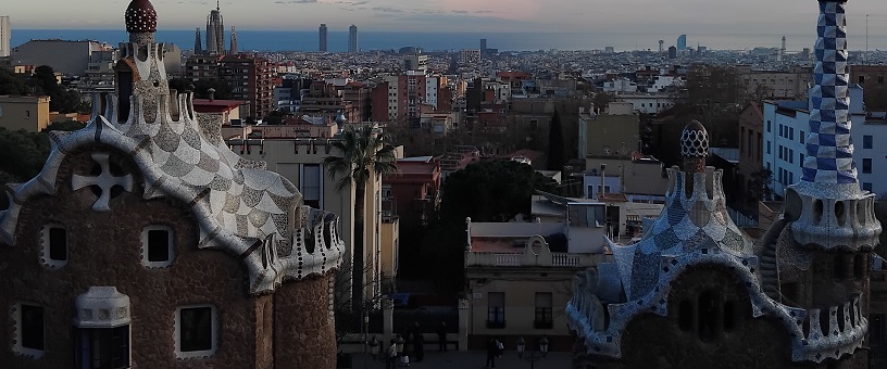 Gaudí's pancake-like houses in Park Güell - and the view over Barcelona city